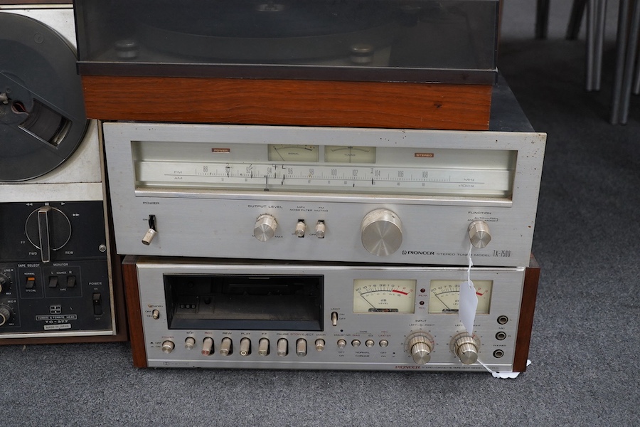 A pair of floorstanding IMF speakers, together with a Sony three-head reel to reel tape recorder, a National Panasonic compact television TR-565G, a Sony integrated stereo amplifier TA-1150, a turntable, a Pioneer tuner